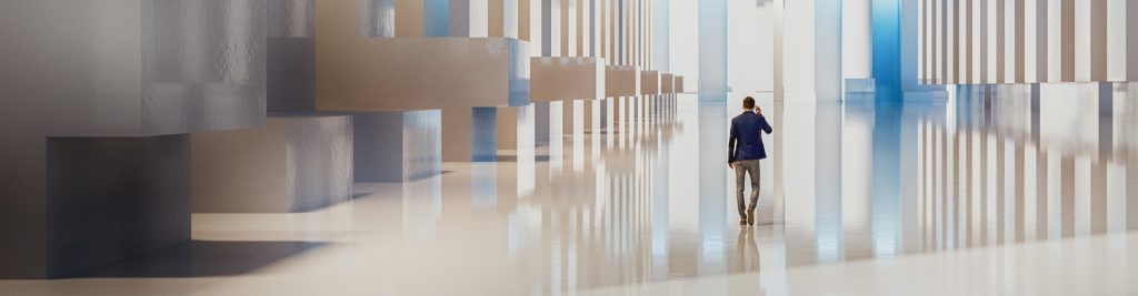 Man in suit walking through a futuristic corridor